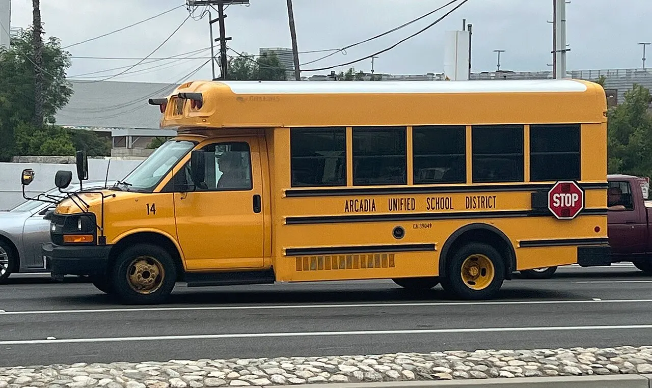 A yellow Arcadia Unified School District school bus
