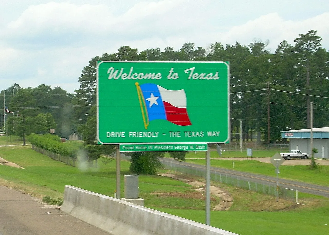 Welcome to Texas state line sign beside Interstate 30 at the Arkansas border