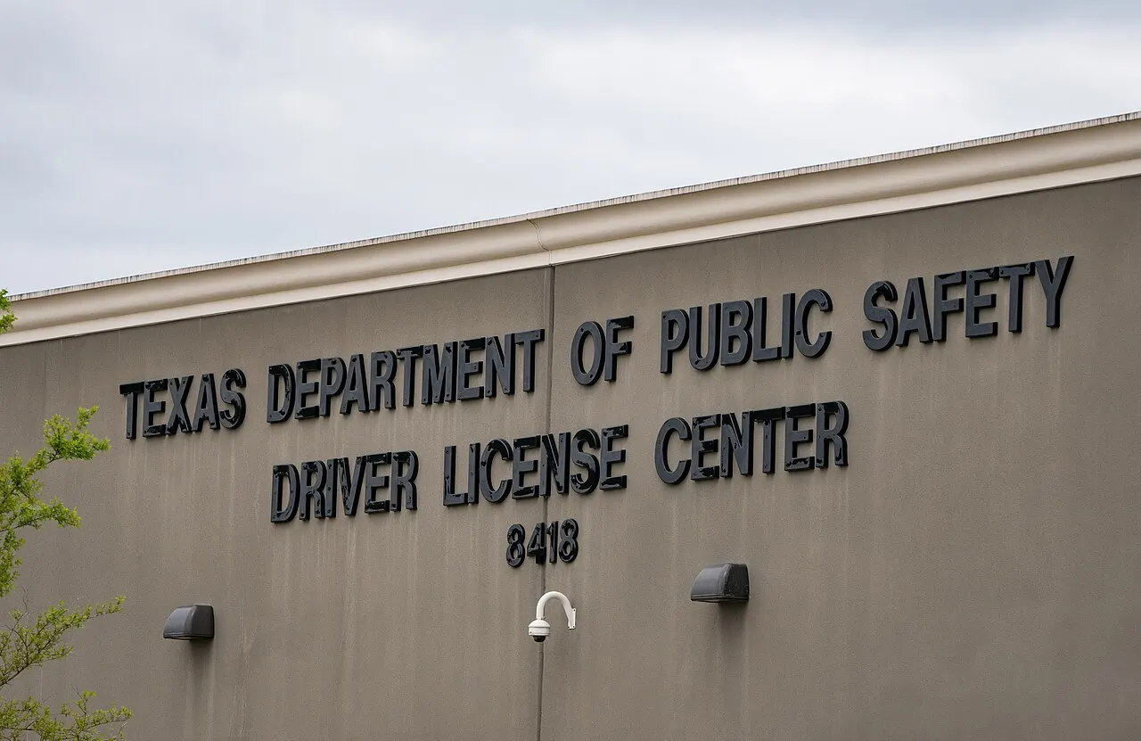 Lettering reading Texas Department of Public Safety Driver License Center on the wall of the office on Veterans Memorial Drive in Houston, Texas