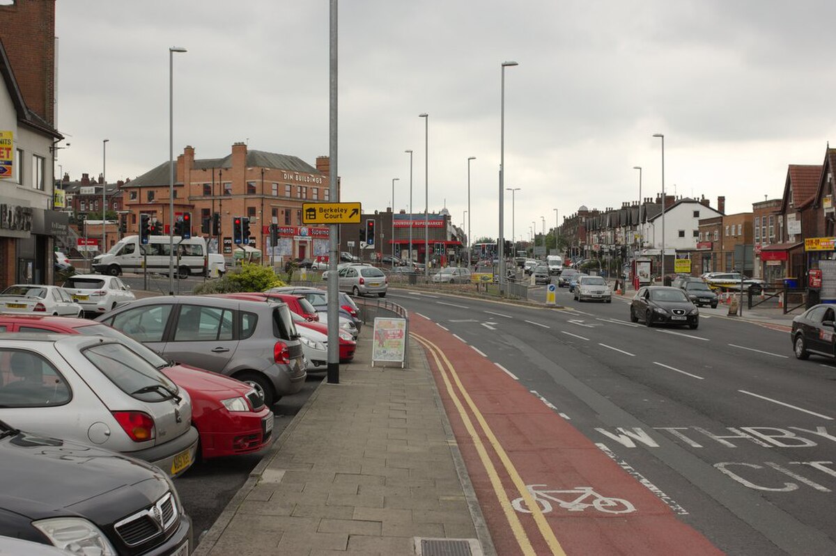 A protected cycle lane on a British urban road, the type of priority-shifting infrastructure that features heavily on inner London test routes