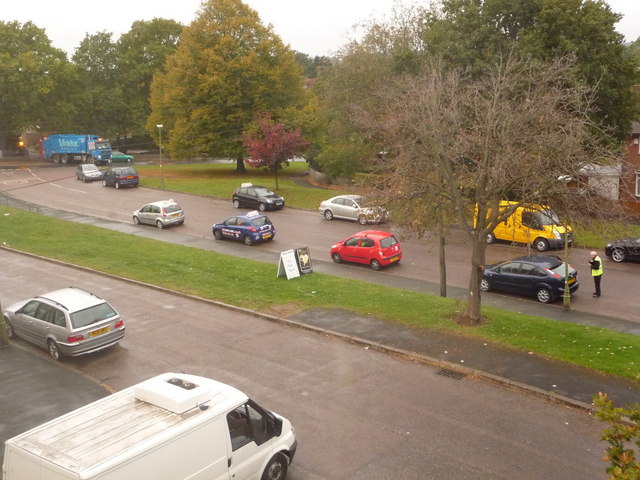 Learner drivers on a quiet residential street, the kind of route that December and January tests often use when peak-season traffic has thinned