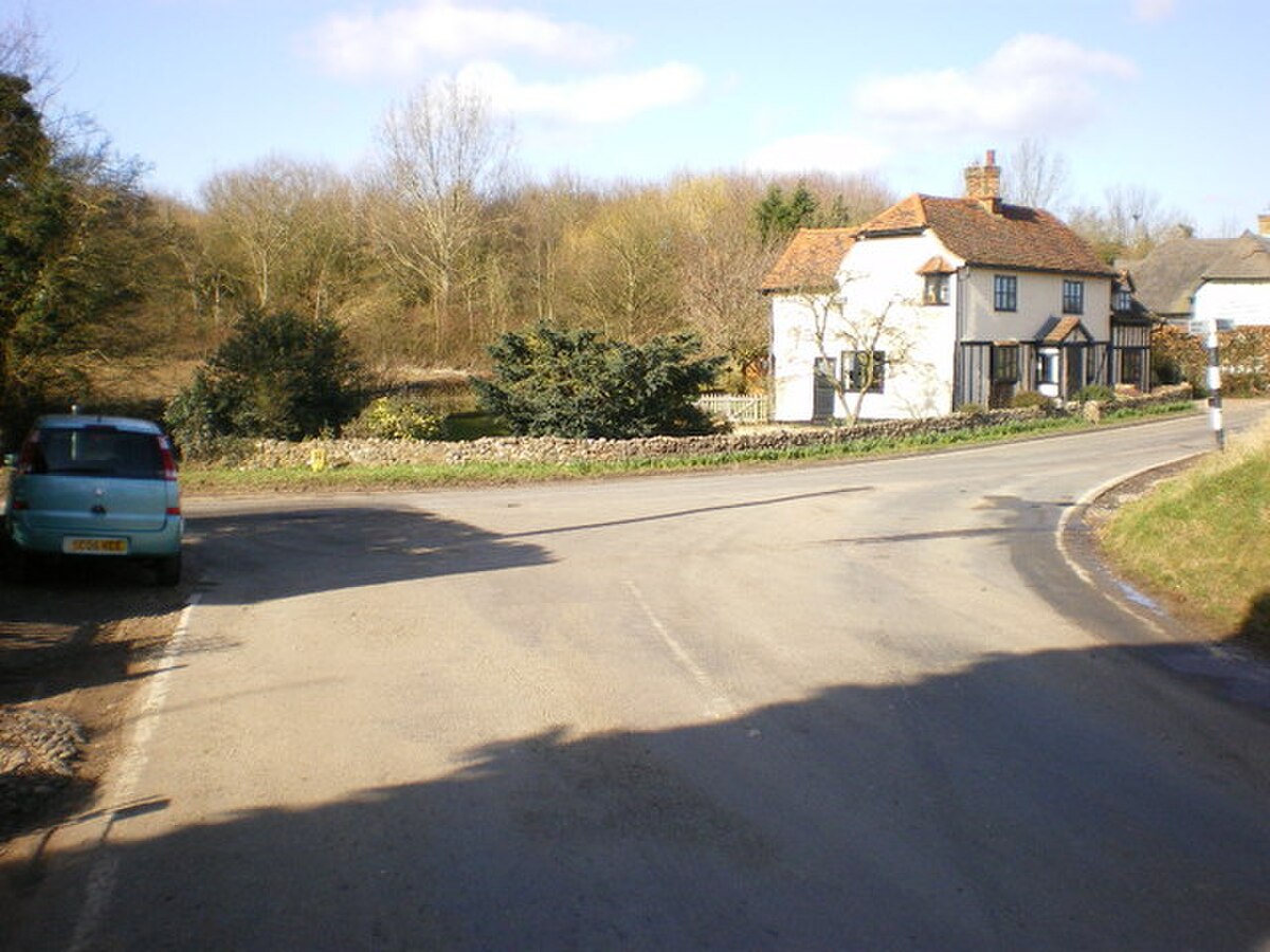 A UK road junction with limited sight lines, the kind of approach where observation faults bite hardest