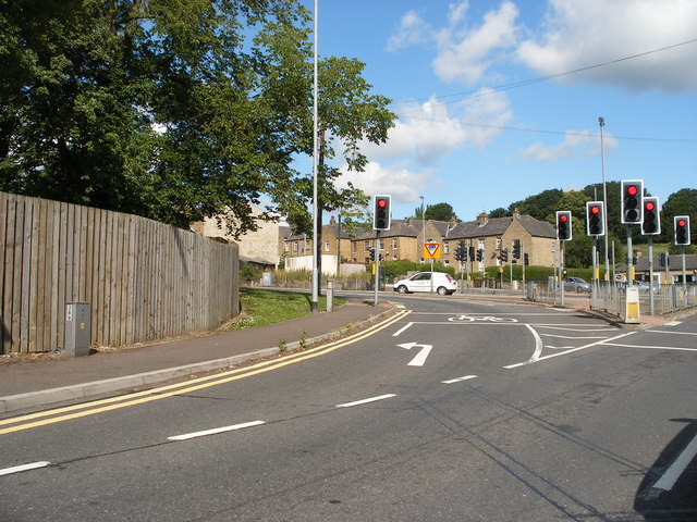 A bank of red traffic lights at a UK road junction
