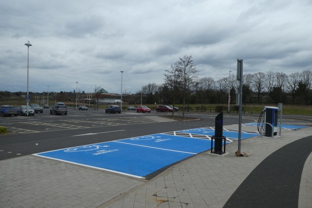An EV charging at a UK forecourt, illustrating the pace of last-minute slot changes once you start watching the booking system