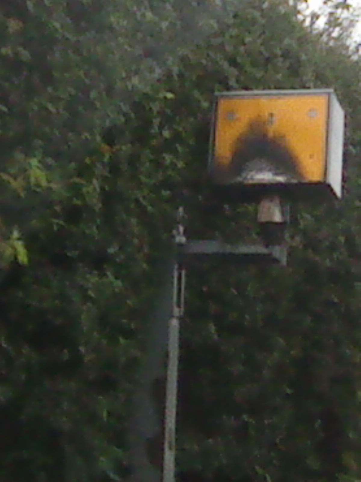 A UK fixed speed camera mounted on a roadside pole, one of several speed monitoring tools new drivers encounter alongside telematics scoring in their first year