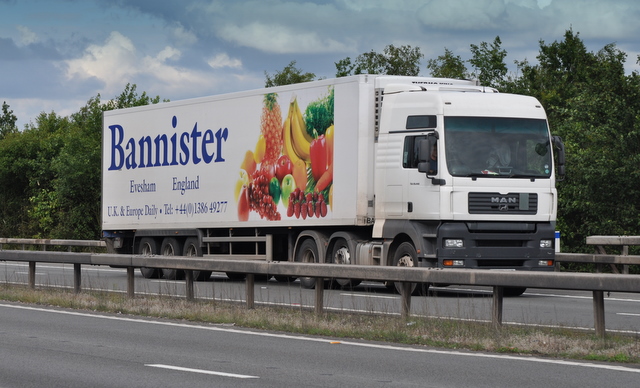 A box-bodied HGV on a UK motorway