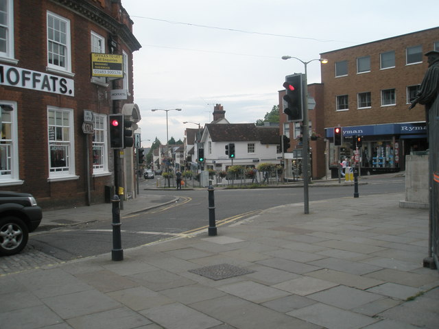 UK traffic lights at a busy town centre junction, typical of the road environment candidates encounter during practical driving tests in urban Bristol